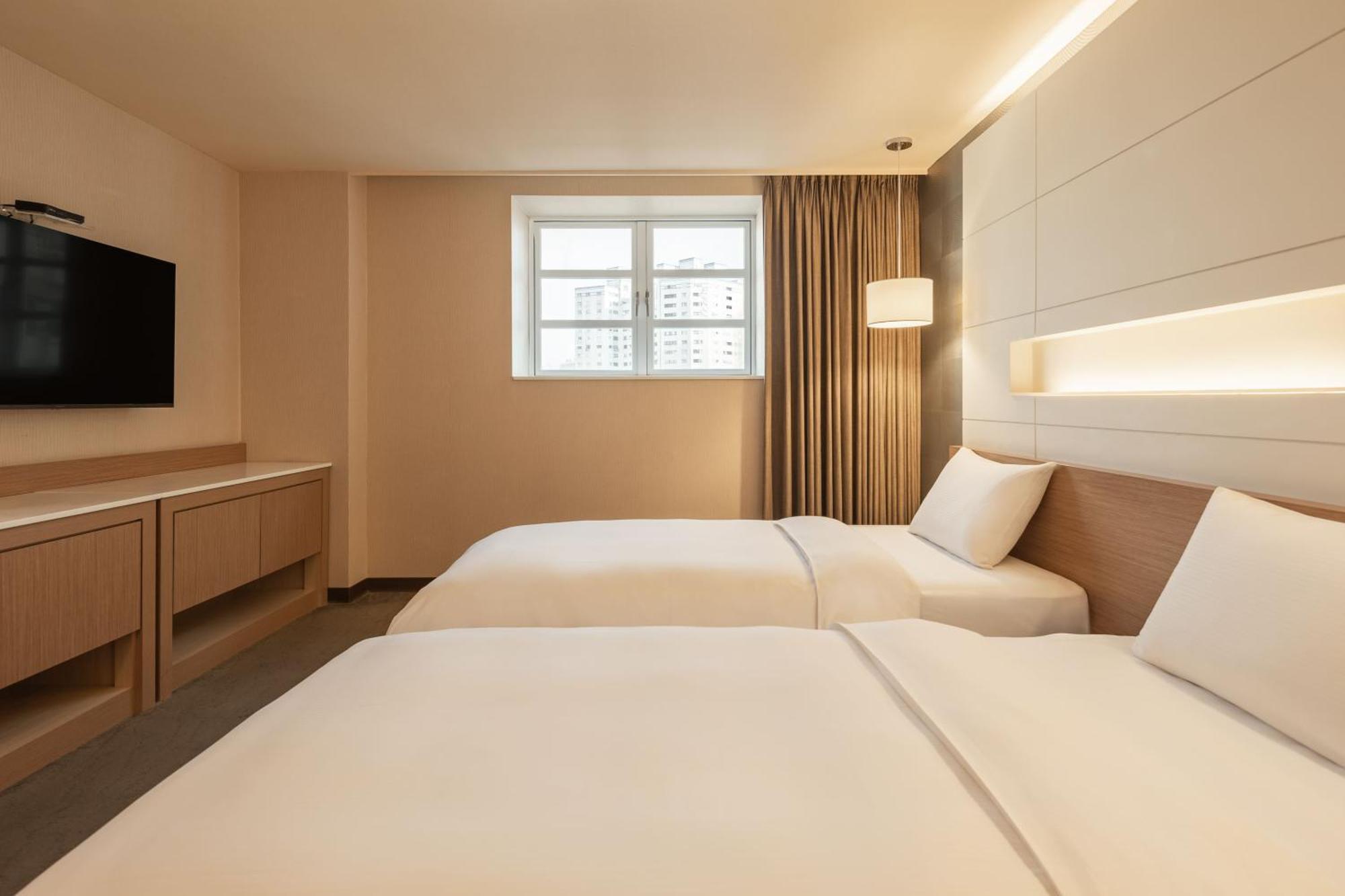 Kindness Hotel - Sandou II Kaohsiung Kamer foto